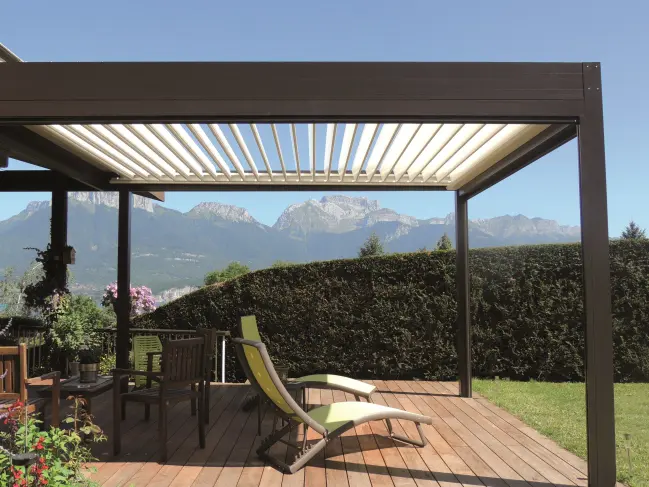 A brown aluminum pergola protects you from the direct sunlight on your porch.